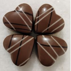 Puedes pedir información o hacer tu pedido en  chocolatesartesanosamor@gmail.com